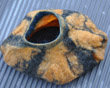 Asymmetrical small vessel, orange and black